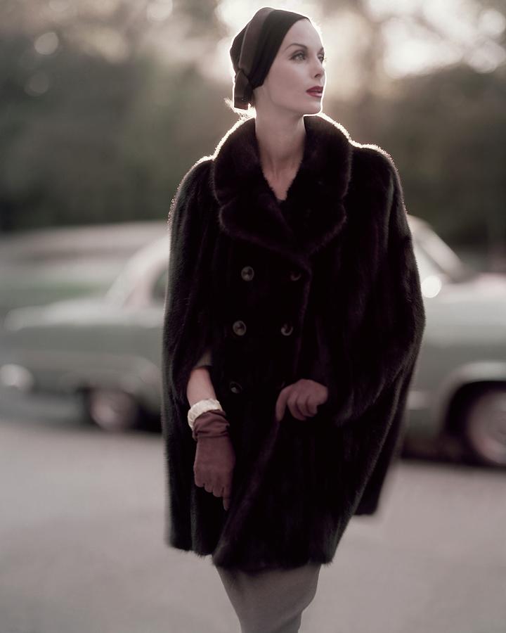 Model Wearing A Fur Cape Photograph by Karen Radkai