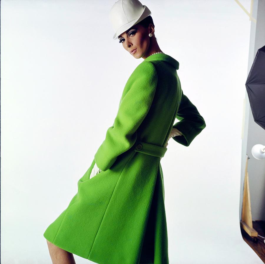 Model Wearing A Green Originala Coat Photograph by Bert Stern