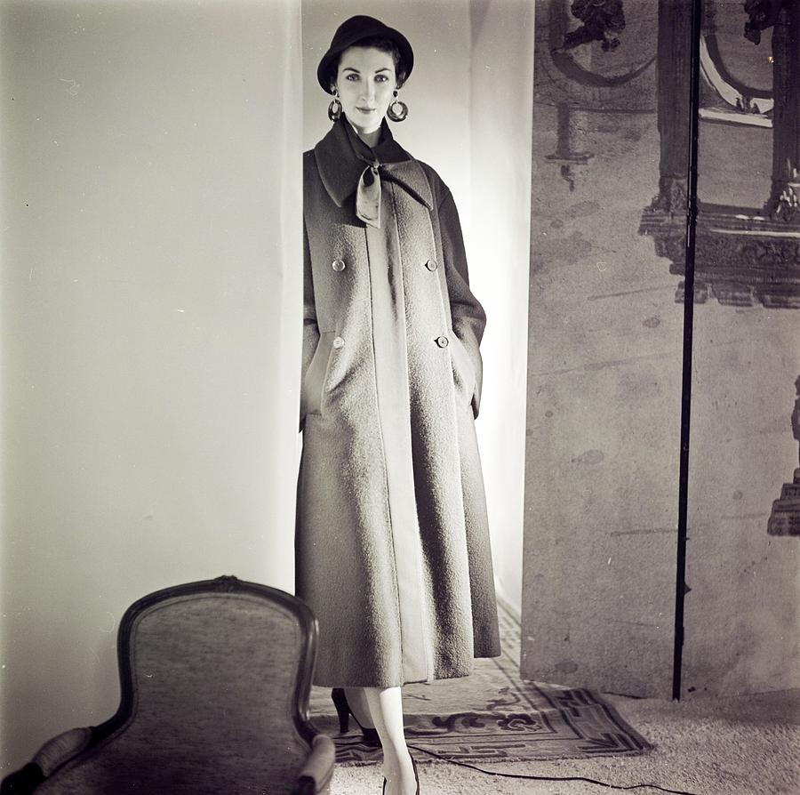 Model Wearing A Hattie Carnegie Coat Photograph by Horst P. Horst