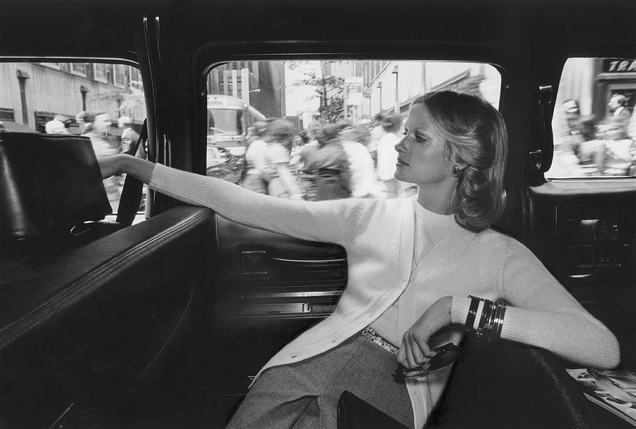 Model Wearing A Its Pure Gould Cardigan In A Taxi Photograph by Kourken Pakchanian