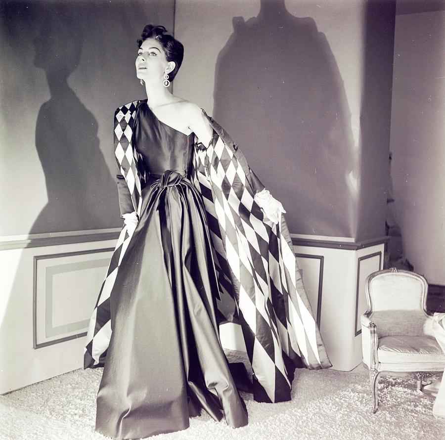 Model Wearing A Jane Derby Coat And Dress Photograph by Horst P. Horst