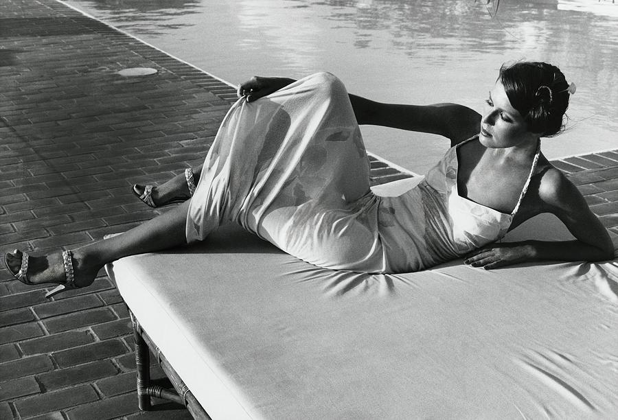 Model Wearing A Leonard Dress Poolside Photograph by Kourken Pakchanian