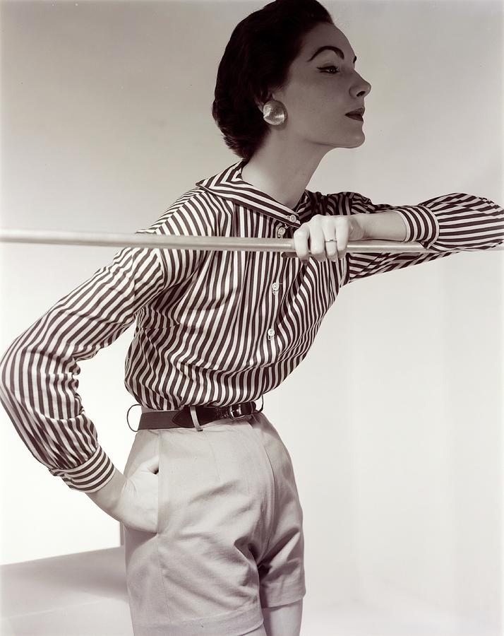 Model Wearing A Nelly De Grab Shirt And Shorts Photograph by Horst P. Horst