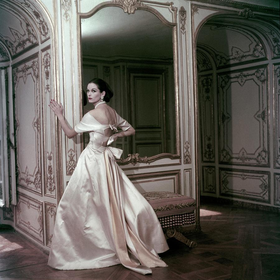 Model Wearing A Satin Evening Dress By Griffe Photograph by Henry Clarke