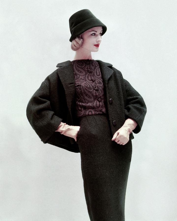 Model Wearing A Skirt Suit Photograph by Karen Radkai