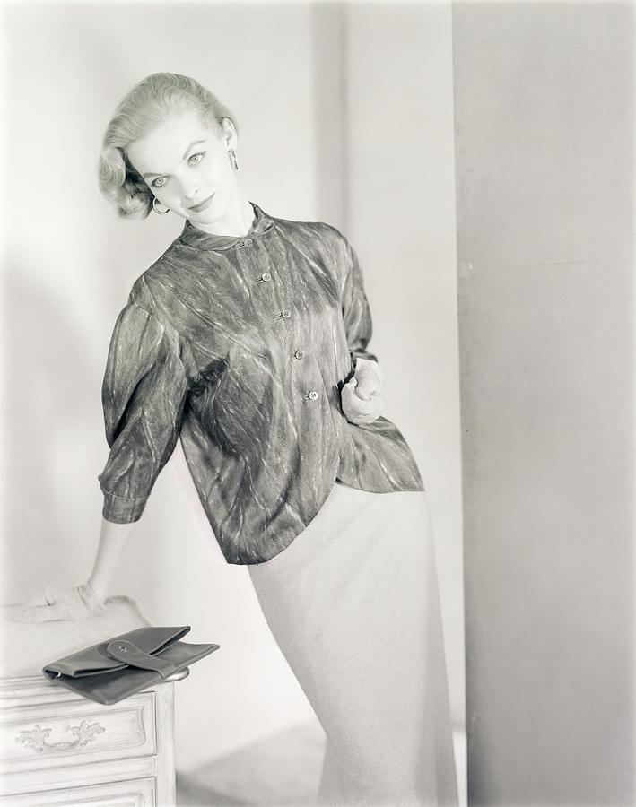 Model Wearing A Tudor Square Jacket And Skirt Photograph by Horst P. Horst