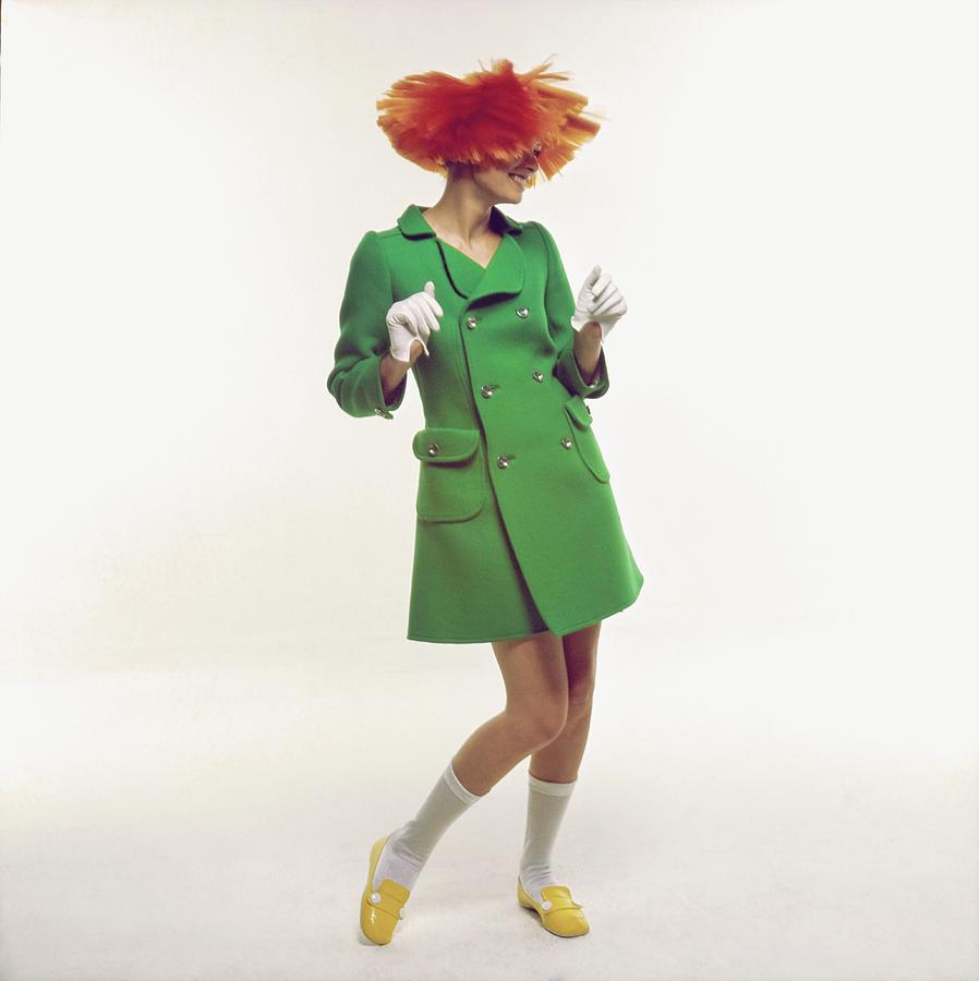 Model Wearing An Andre Courreges Coat Photograph by Bert Stern