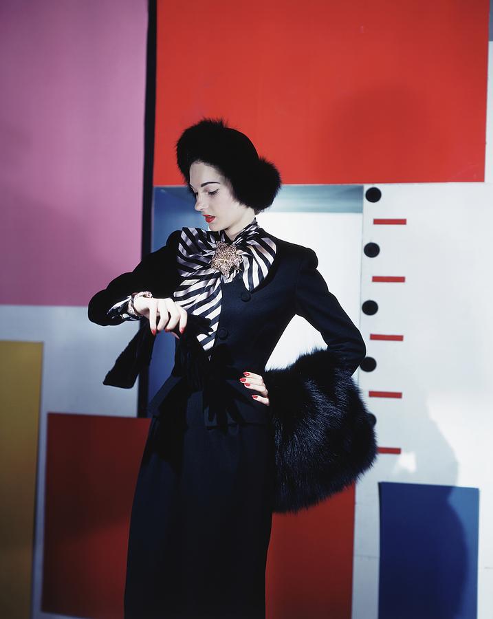 Model Wearing Black Suit Checking Her Watch Photograph by Horst P. Horst