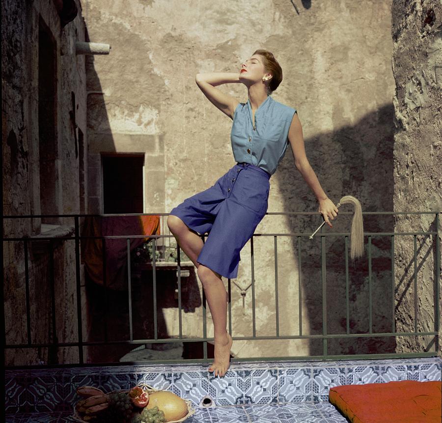 Model Wearing Blue Culottes And A Sea-green Shirt Photograph by Henry Clarke
