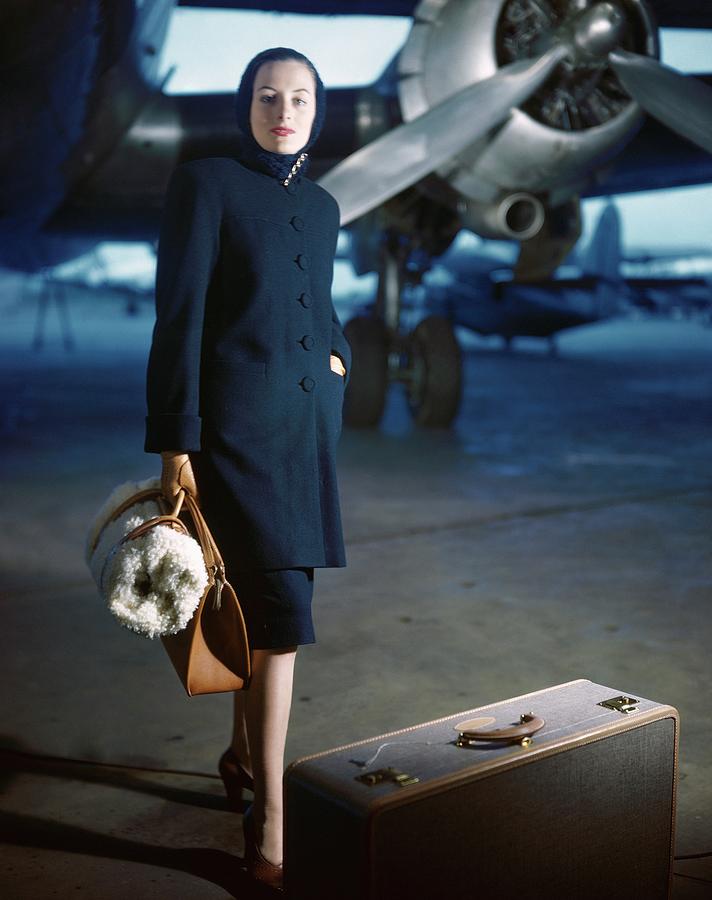 Model Wearing Ceil Chapman Coat At Airport Photograph by Frances McLaughlin-Gill