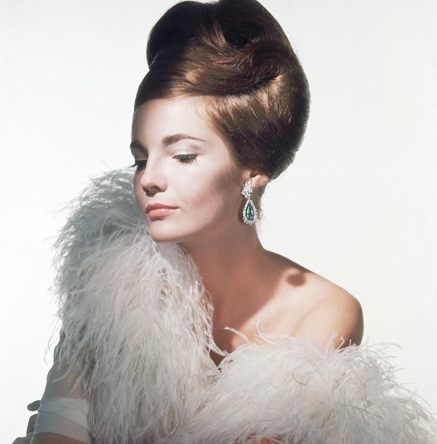 Model Wearing Feather Boa And Earrings Photograph by Horst P. Horst