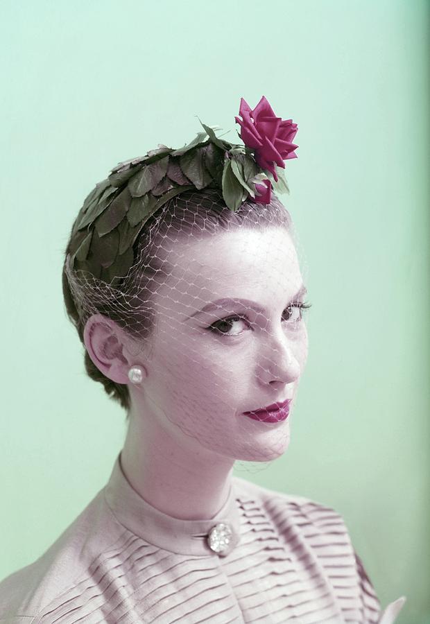 Model Wearing Hat Of Leaves And A Rose Photograph by Clifford Coffin; Frances McLaughlin-Gill