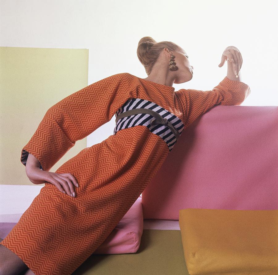 Model Wearing Orange And Striped Dress Photograph by Horst P. Horst