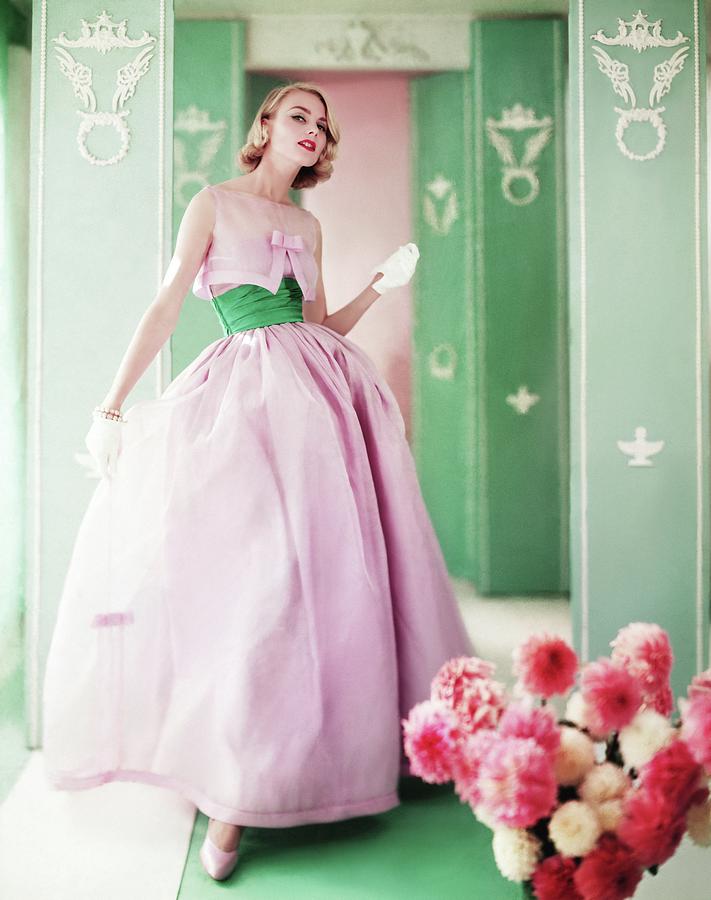 Flowers Still Life Photograph - Model Wearing Pink Dress by Horst P. Horst