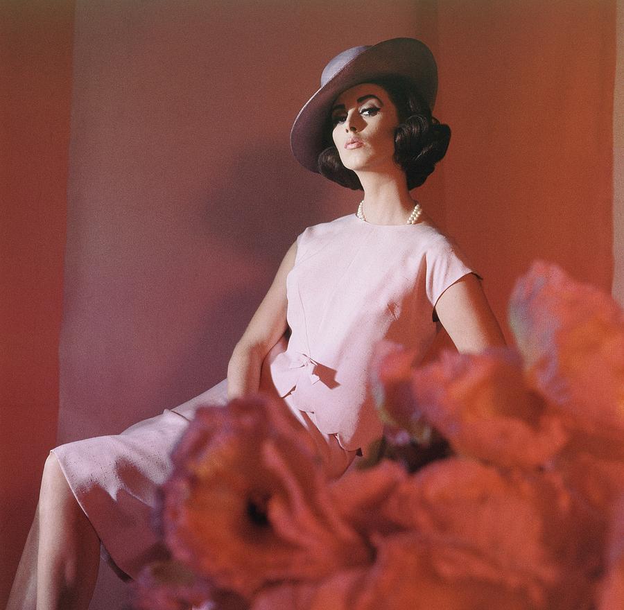 Model Wearing Pink Ensemble With Hat Photograph by Horst P. Horst
