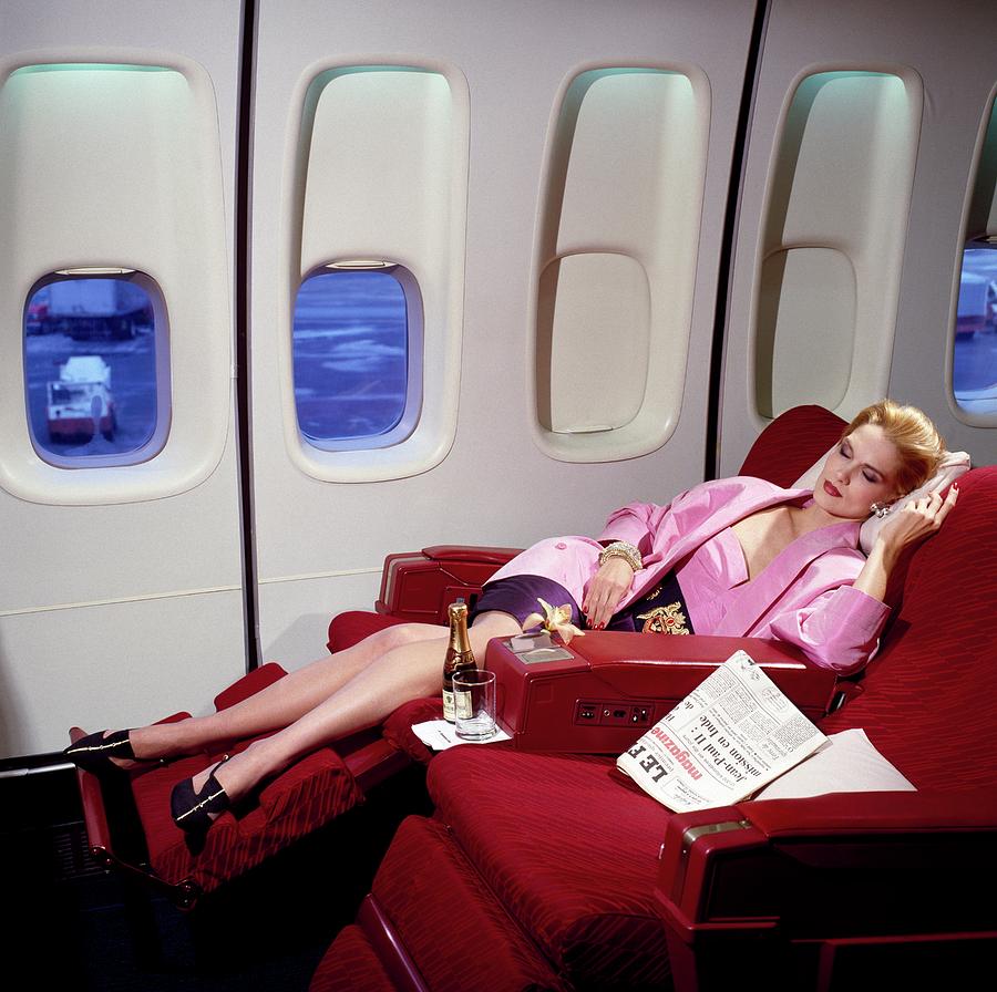 Model Wearing Pink Jacket On Airplane Photograph by Horst P. Horst