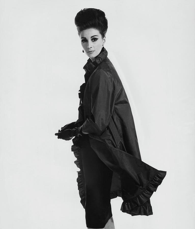 Model Wearing Ruffled Raincoat Photograph by Karen Radkai