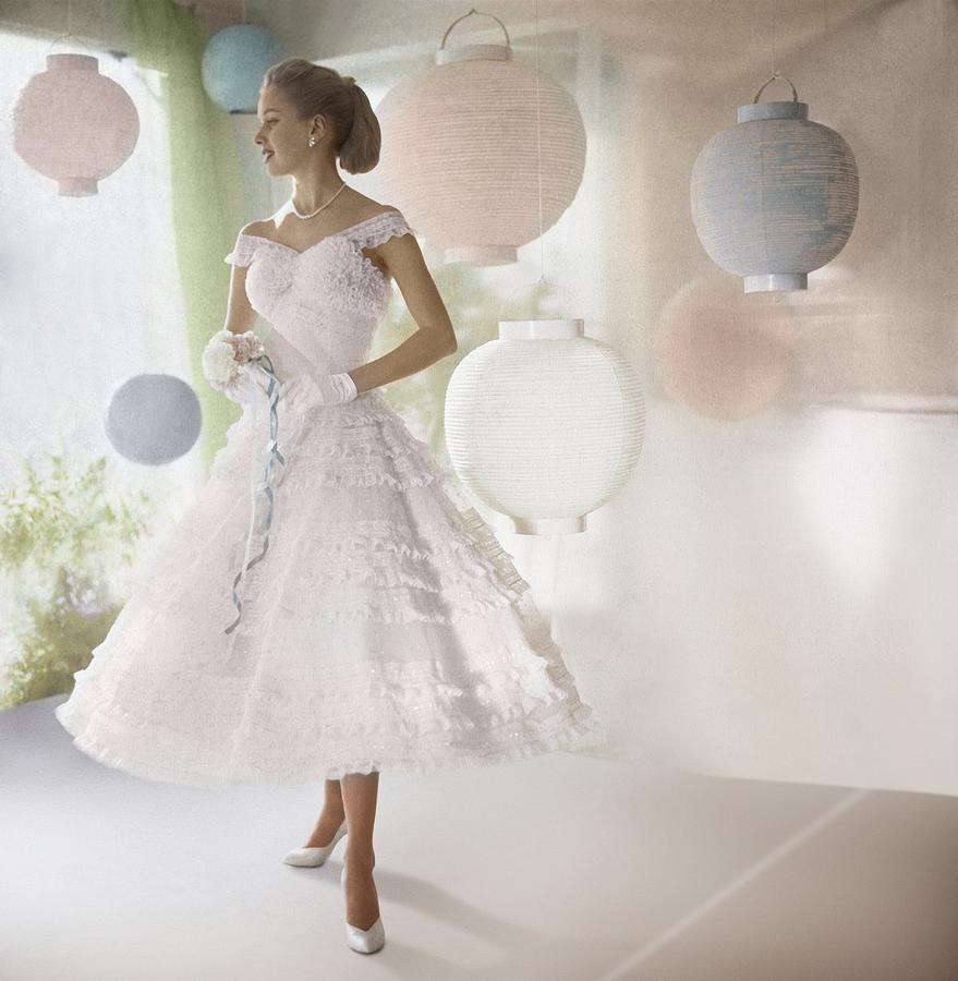 Model Wearing White Dress By Lanterns Photograph by Horst P. Horst