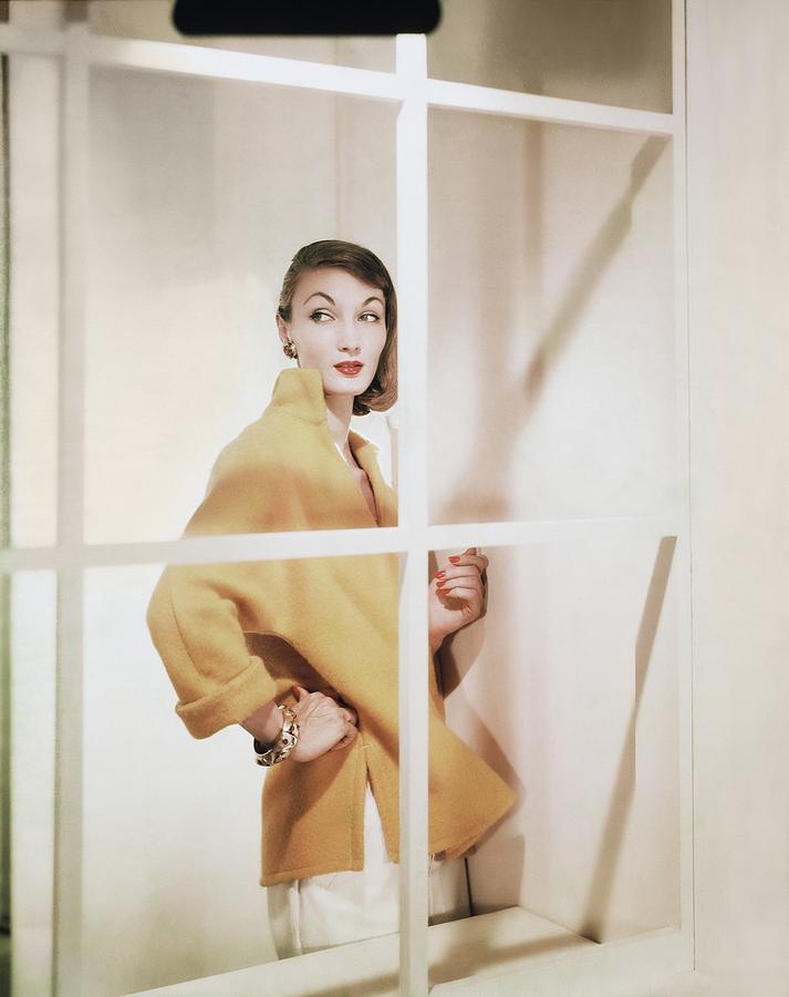 Model Wearing Yellow Sweater Photograph by Horst P. Horst
