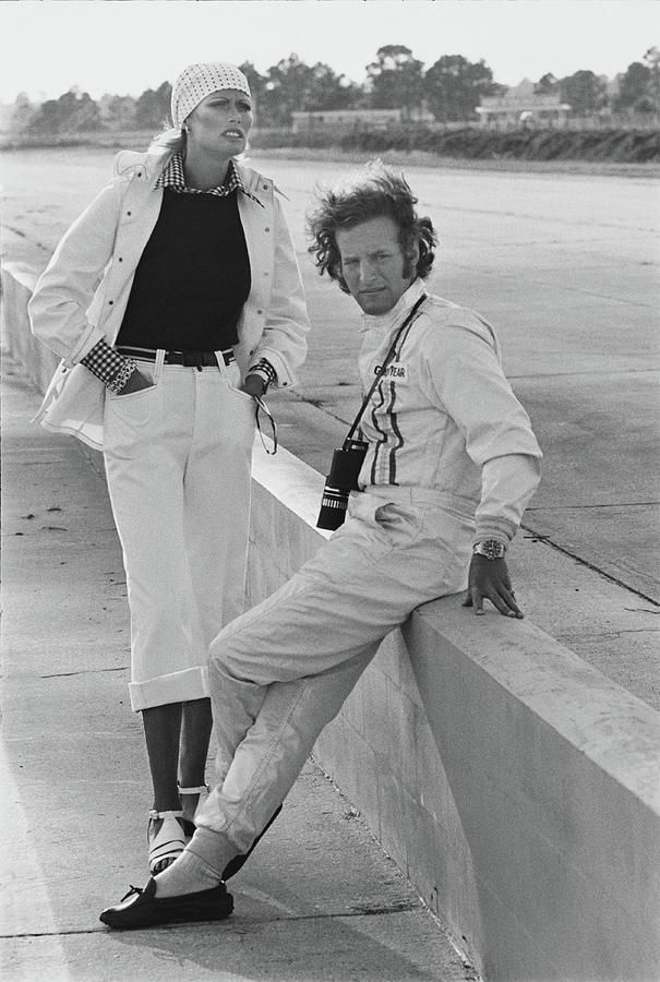 Model With Hurley Haywood At Sebring Race Track Photograph by Kourken Pakchanian