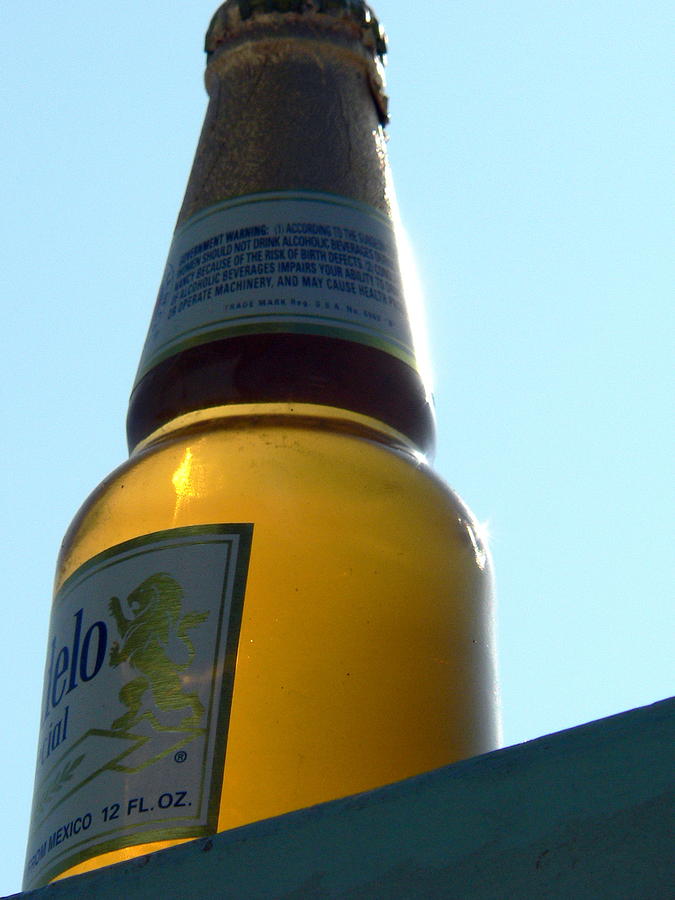 Modelo Beer Bottle Sunset Photograph by Jeff Lowe