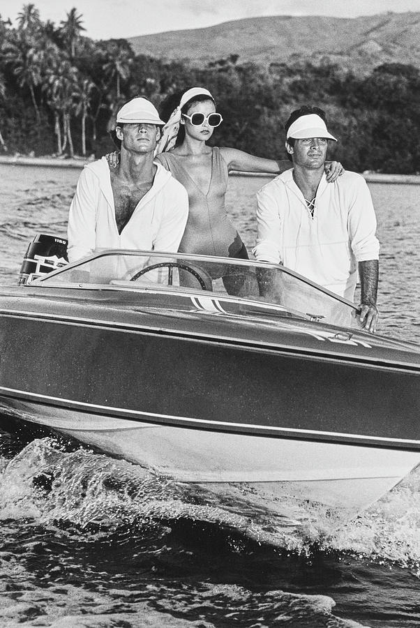 Models On A Motorboat In Tahiti Photograph by Chris von Wangenheim