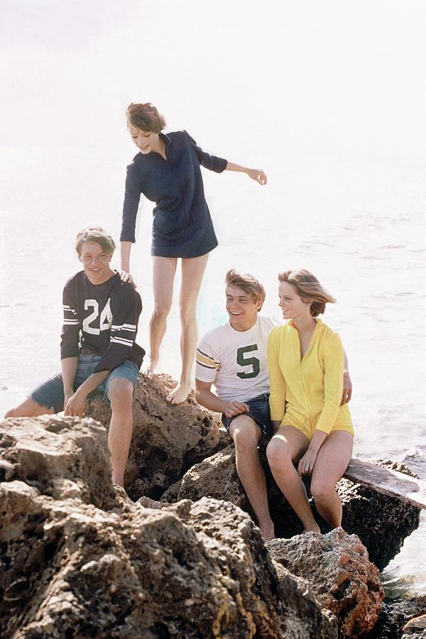 Models On A Rock Photograph by William Connors