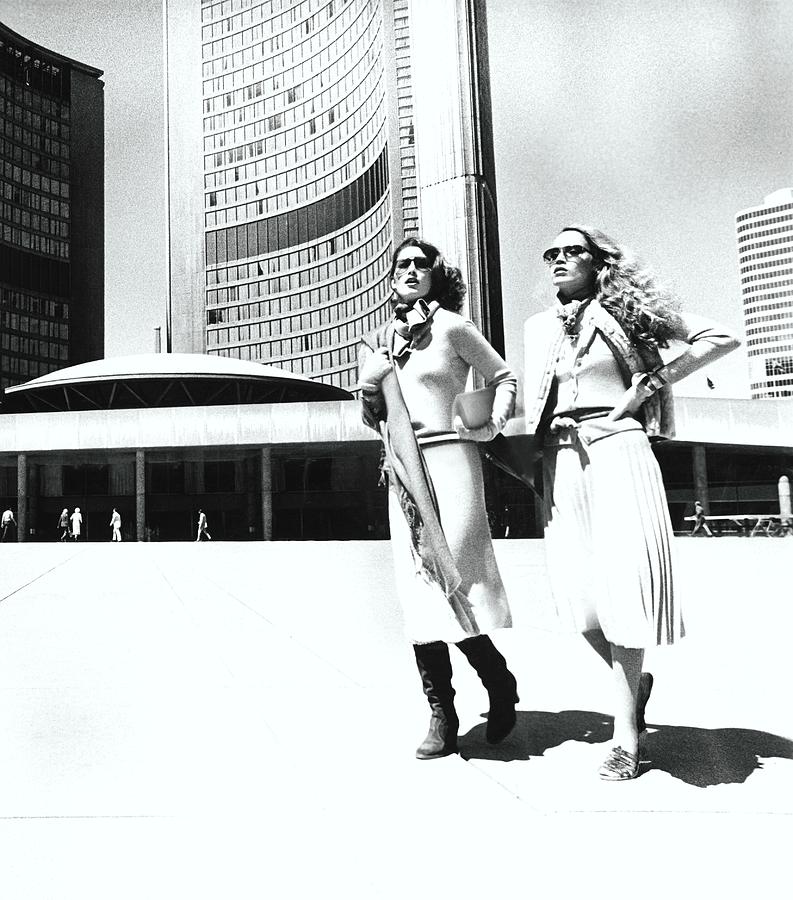Models Walking By City Hall Plaza In Toronto Photograph by Albert Watson
