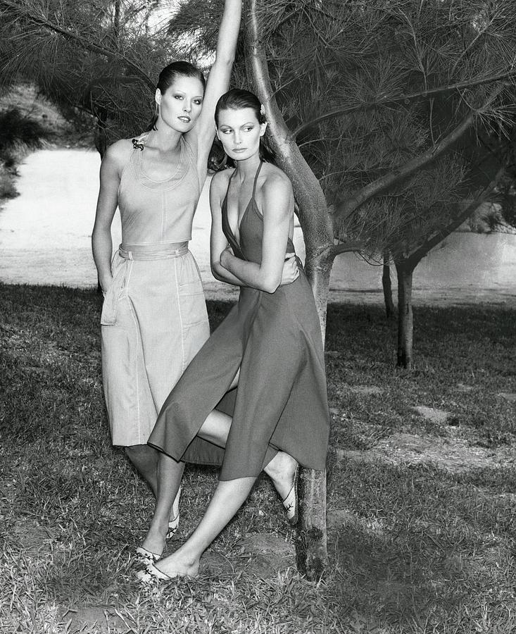 Models Wearing Dalton And Calvin Klein Leaning Photograph by Kourken Pakchanian