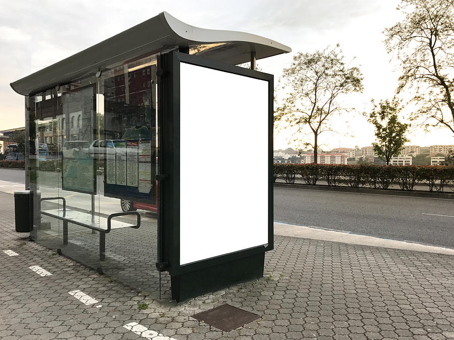 Modern bus stop with billboard Photograph by Photography taken by Mario Gutiérrez.