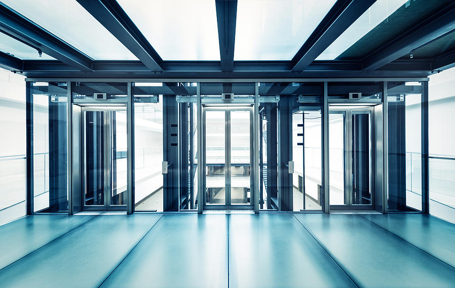 Modern business hall lifts Photograph by PPAMPicture