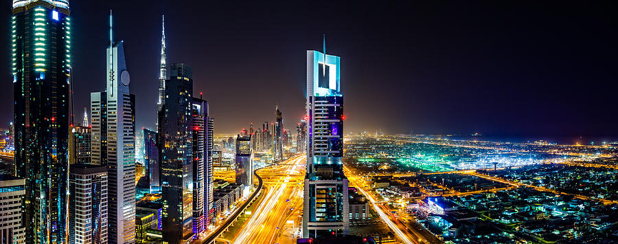 Modern Dubai cityscape at twilight, United Arab Emirates Photograph by Mbbirdy