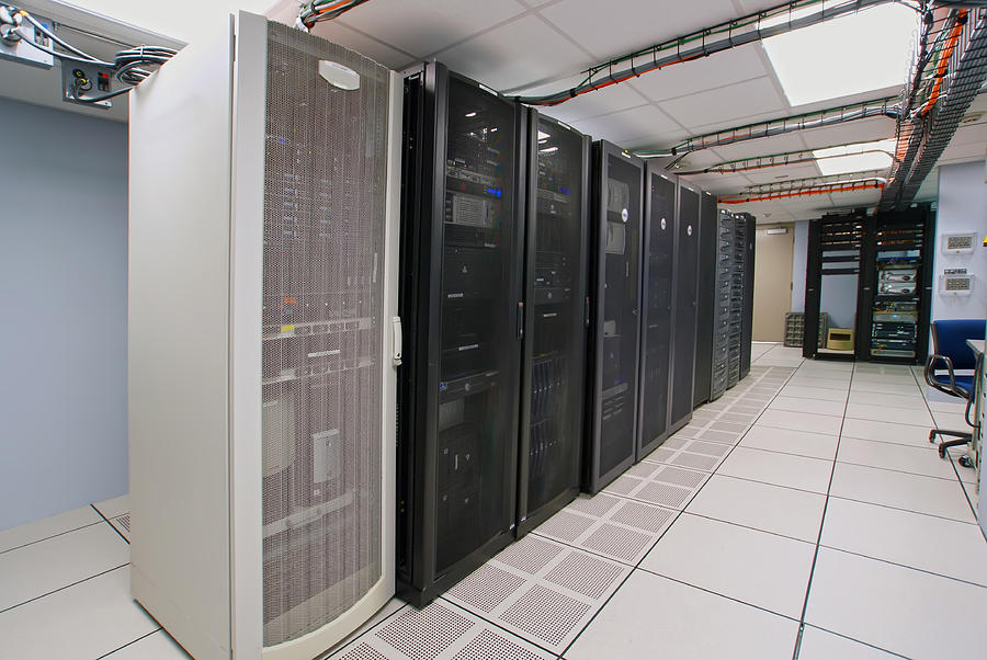 Modern interior of server room in datacenter Photograph by Alex ...