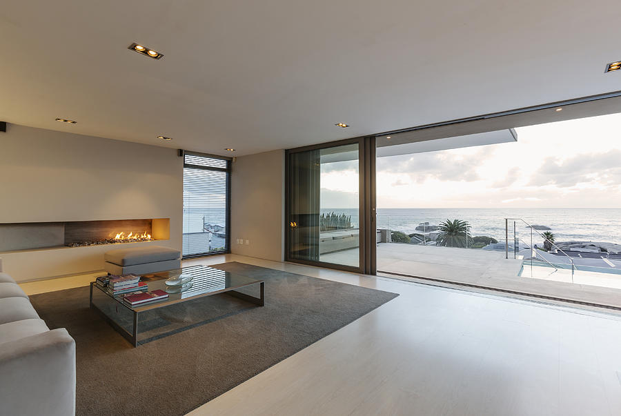 Modern Minimalist Luxury Living Room With Gas Fireplace And Patio