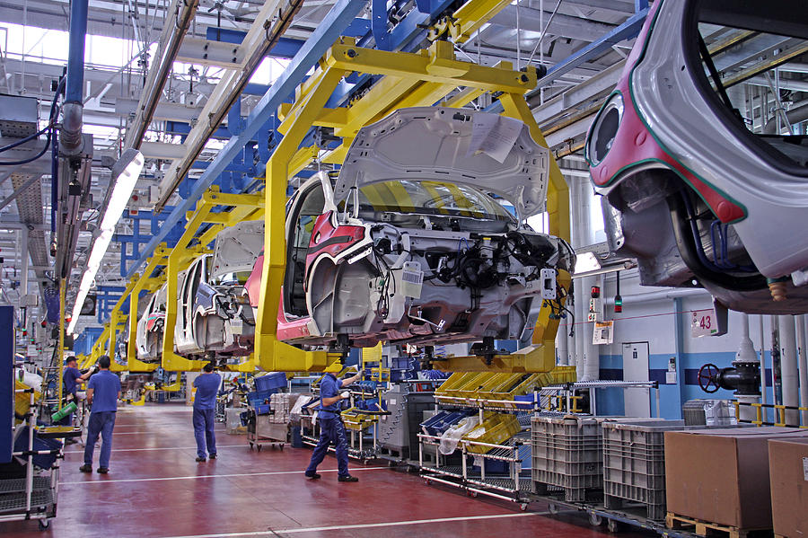Modern vehicles on the production line Photograph by Tramino