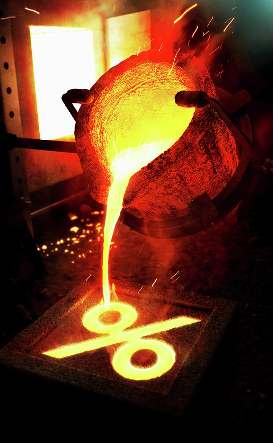Molten Metal Pouring Into Percentage Photograph by Ikon Ikon Images