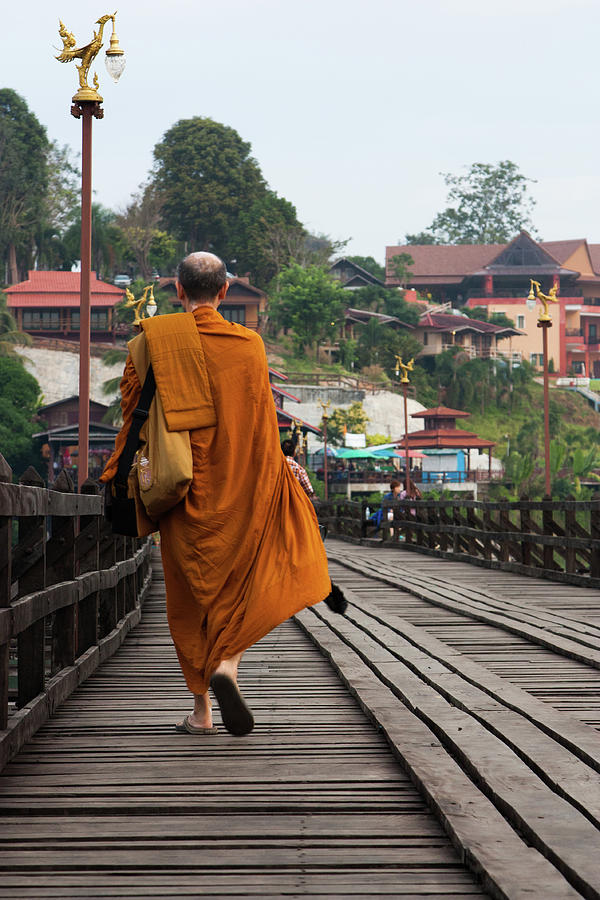 Monk Walking Across Wooden Bridge Photograph by Kat Payne Photography