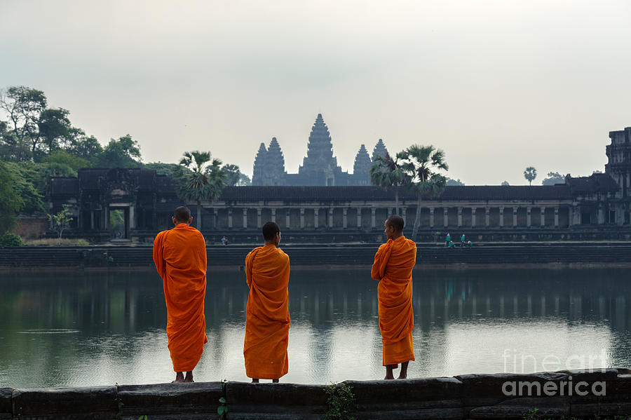 Monks in front of Angkor Wat temple - Cambodia Photograph by Matteo Colombo