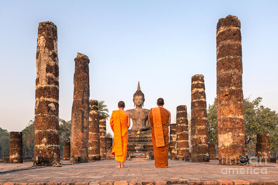 Monks in front of Wat Mahathat temple - Sukhothai Photograph by Matteo Colombo