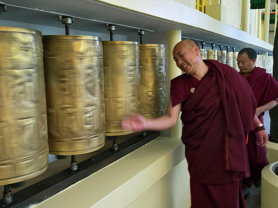 Color Image Photograph - Monks Spinning Prayer Wheels by Panoramic Images
