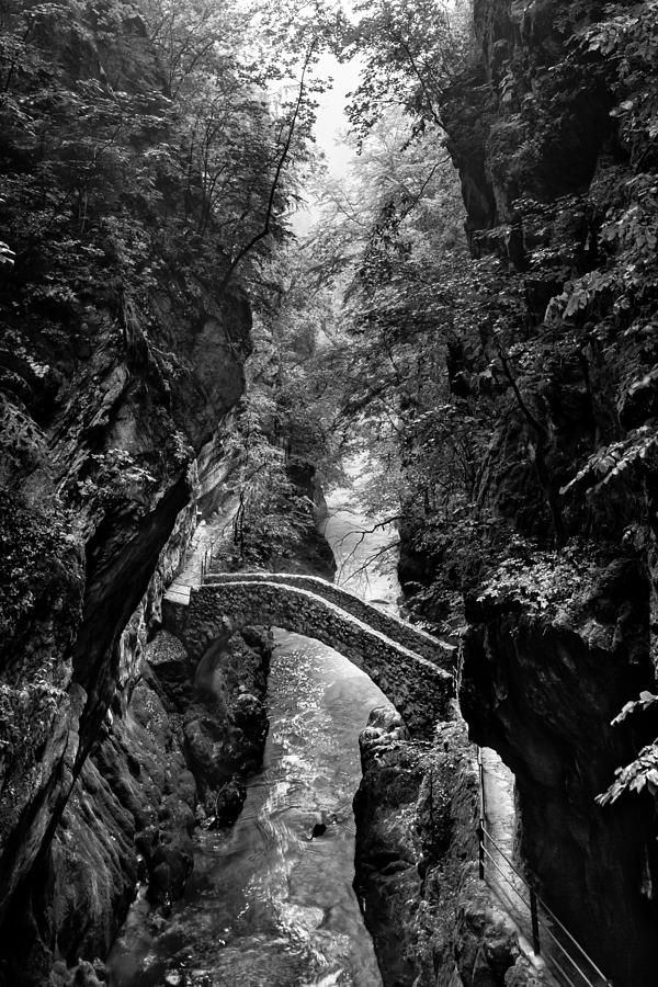 Monochrome image of the stone bridge in the Val dAreuse Photograph by Charles Lupica