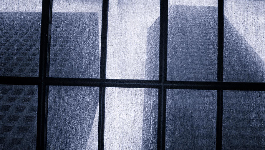 Monoliths Skylight In Rain Photograph by Tony Grider