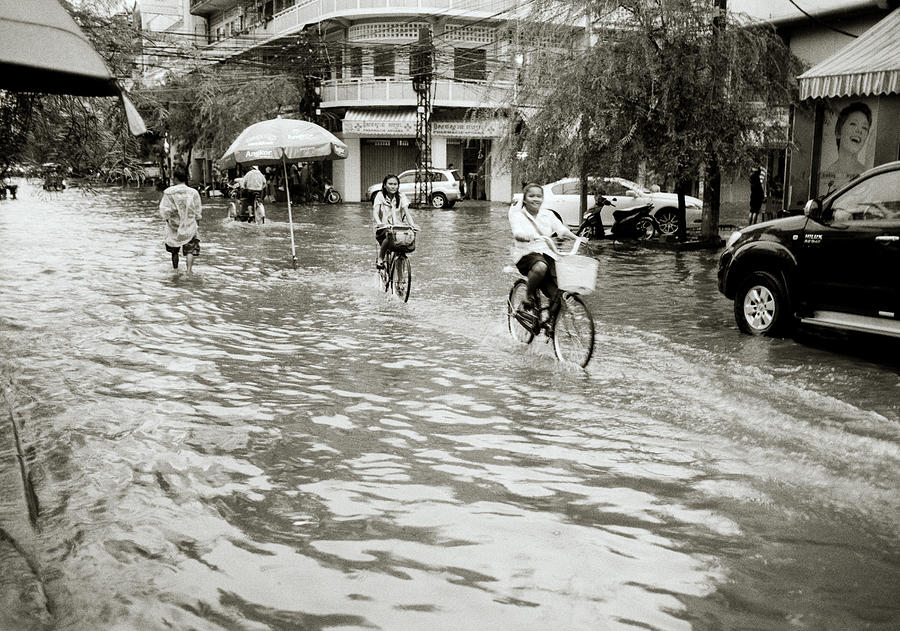 Monsoon In Phnom Penh Photograph by Shaun Higson