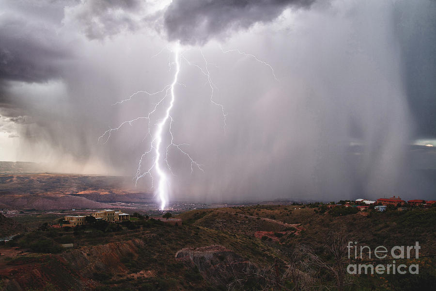 Monsoon Lightning hits Clarkdale Arizona as seen from Jerome Photograph by Ron Chilston