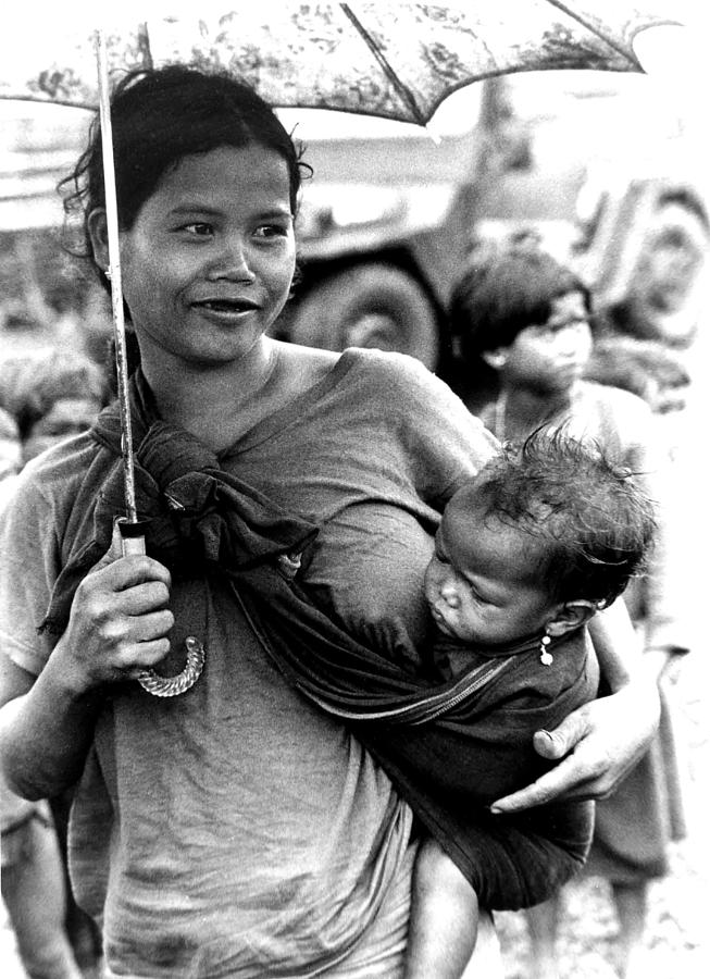 Montagnard Woman With Umbrella And Child Photograph