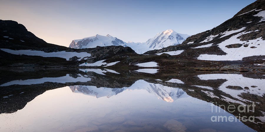 Monte rosa mountain range reflected in Riffelsee lake at sunrise Photograph by Matteo Colombo