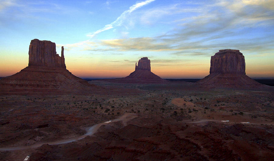 Sunset Photograph - Monument Valley Just After Sunset by Mike McGlothlen