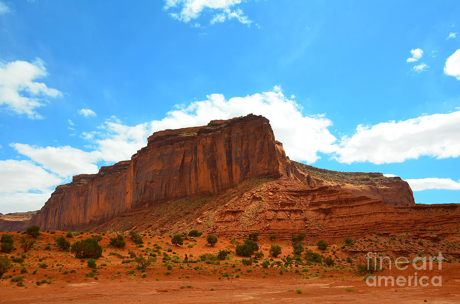 Monument Valley Rock Formation and Clouds Photograph by Debra Thompson