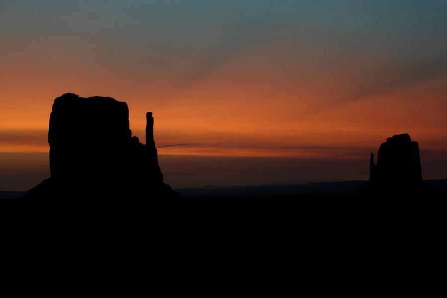 Monument Valley silhouette at sunrise Photograph by Jetson Nguyen