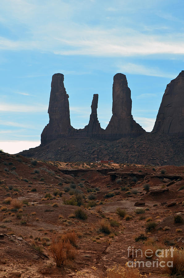 Monument Valley Three Sisters Sandstone Spire Formation Photograph by Shawn OBrien